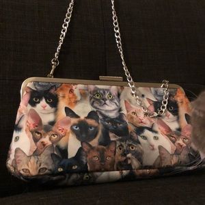 Cat Lady purse with silver chain strap.